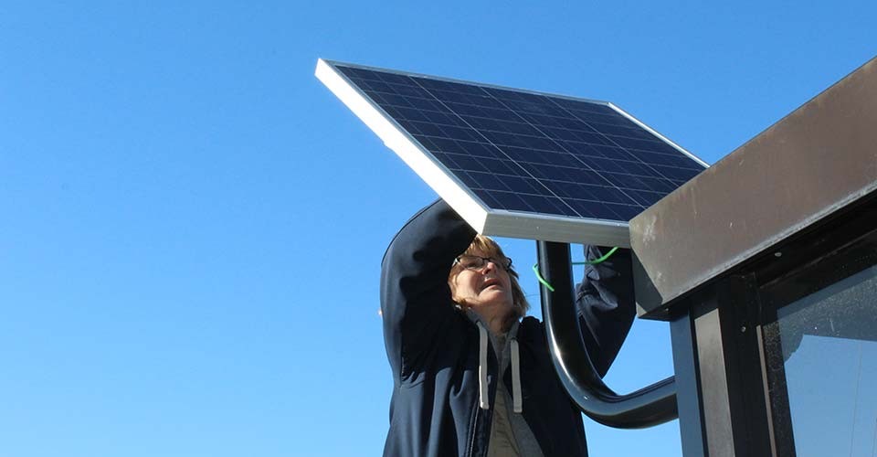 Panels University Solar Lighting: Eastern Michigan installs at bus stops