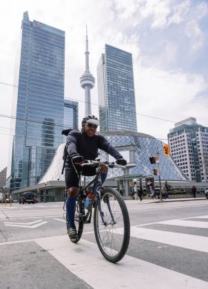 Man bicycling in the city.