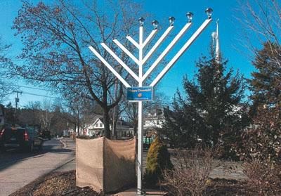 solar powered menorah aglow in woodstock