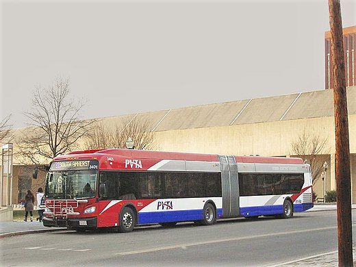 A New Flyer XDE60 Xcelsior articulated hybrid-electric bus operated by UMass Transit